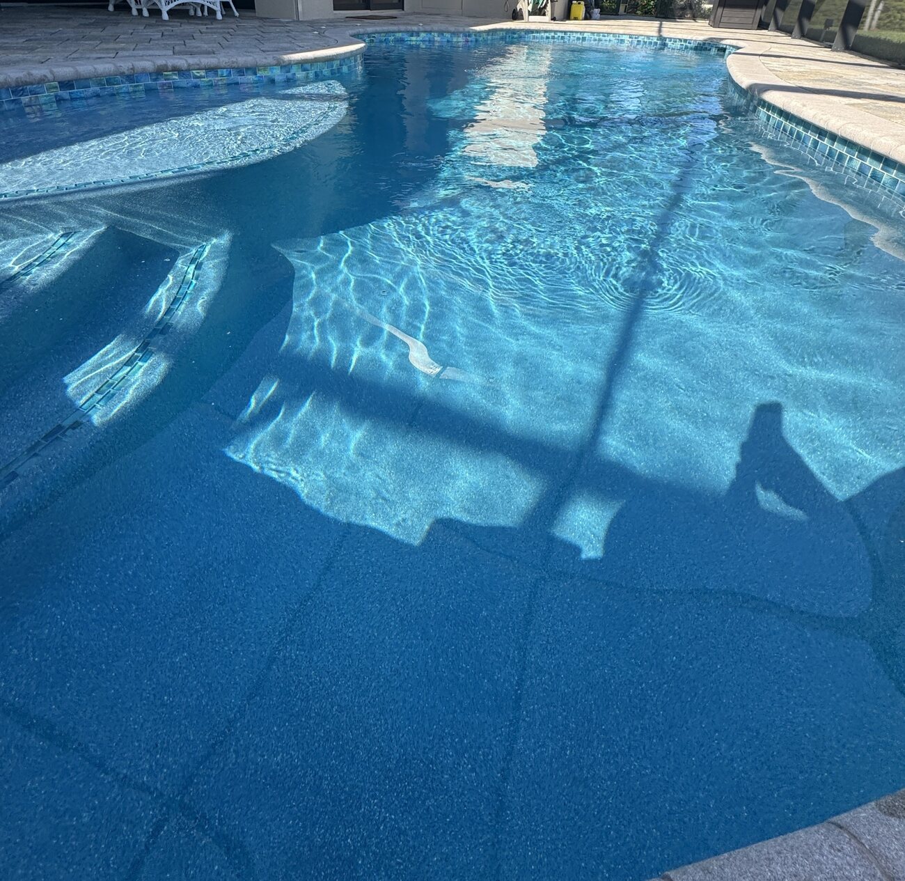 South Gulf Cove pool resurfaced with Aqua White Mini finish